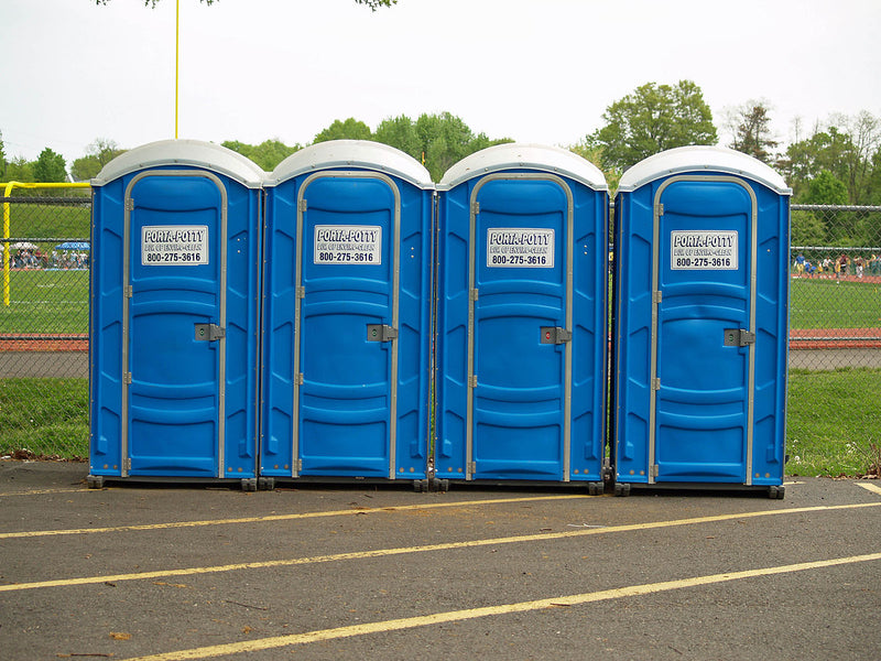 how does a porta potty work